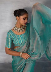 India Silk Teal Green Sarees Crafted With The New Trending Moss Fabric Offer A Perfect Blend Of Tradition